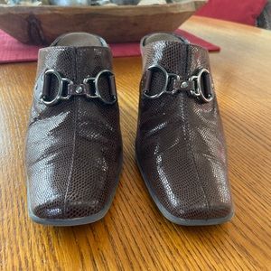 Lightly worn Aerosoles with stacked heels.